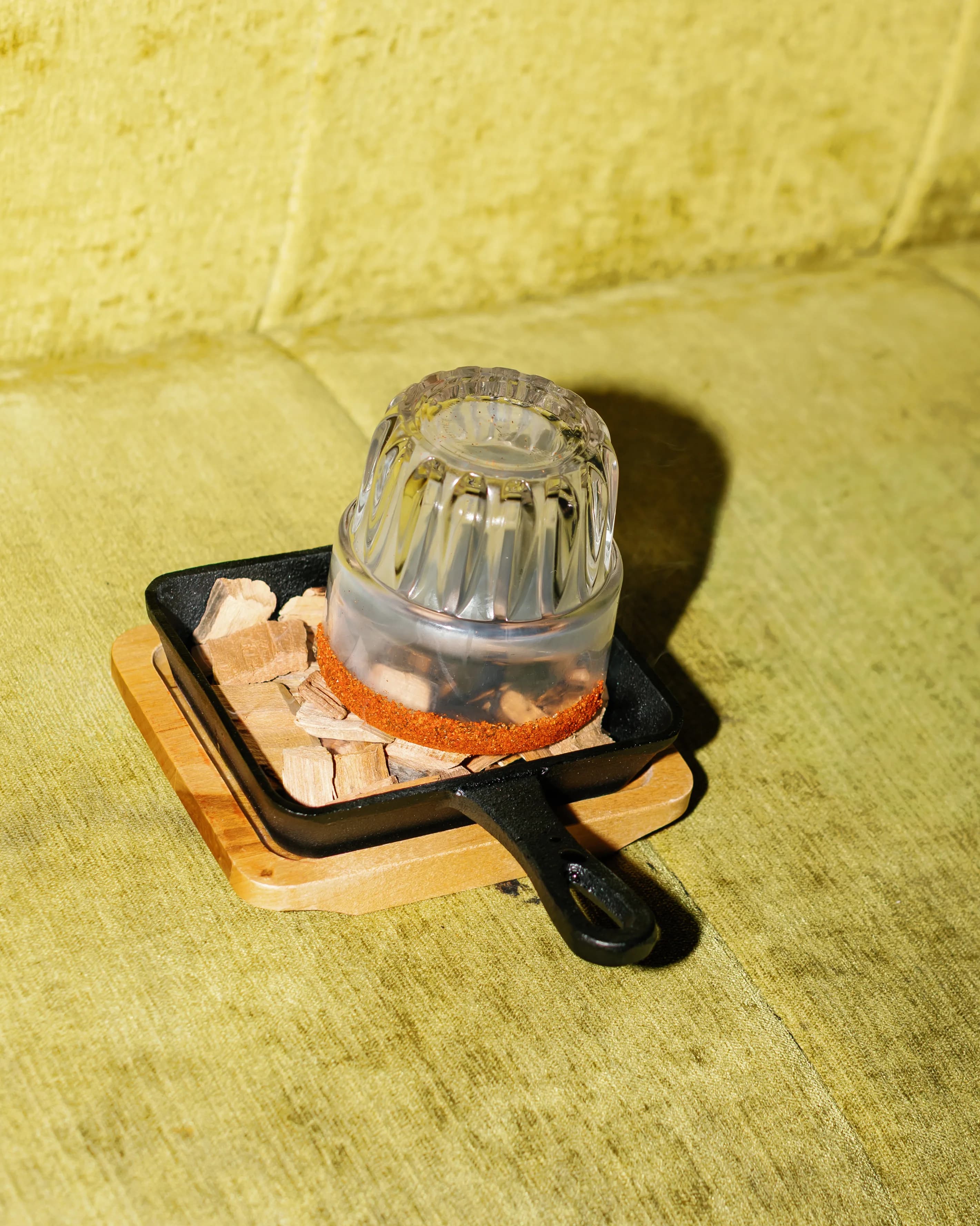 Darling Aviary Smoked Old Fashioned cocktail under a glass smoke dome — handcrafted rooftop cocktail bar program at 712 K Street in DoCo, Downtown Sacramento